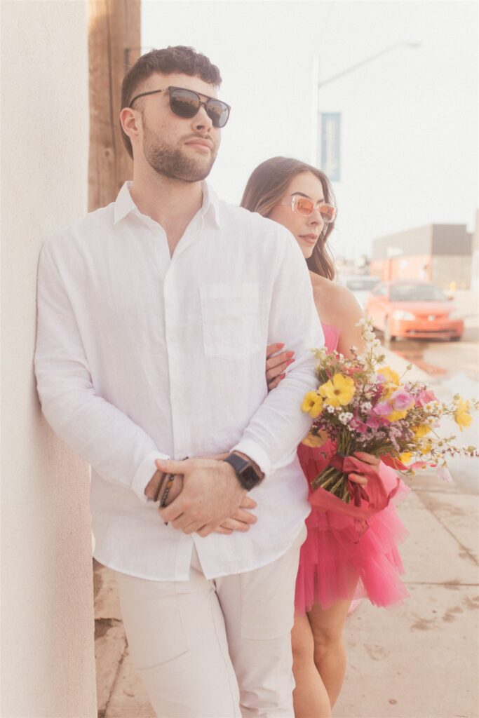 bright and playful photoshoot with couples posing downtown - saskatoon photos
