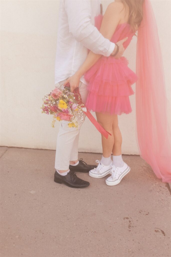 bright and playful photoshoot with couples posing downtown - saskatoon photos
