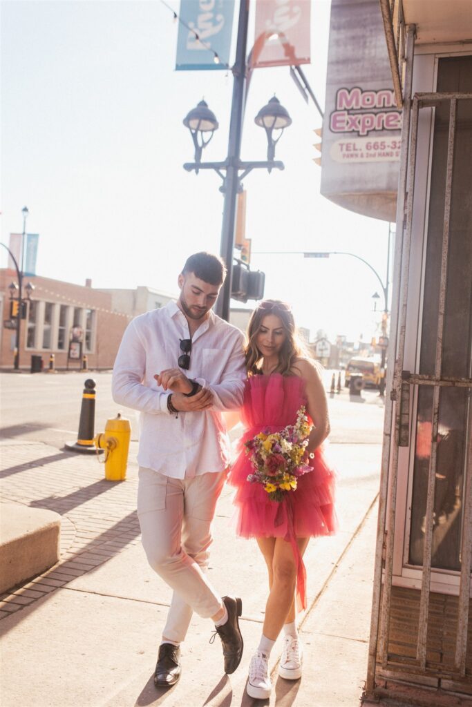 bright and playful photoshoot with couples posing downtown - saskatoon photos
