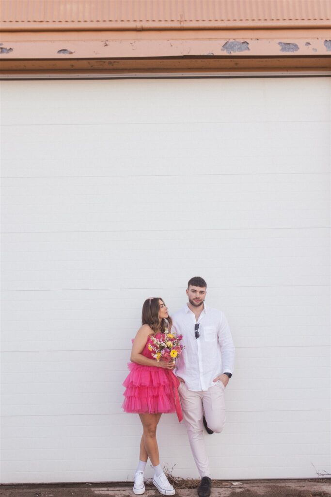 bright and playful photoshoot with couples posing downtown - saskatoon photos
