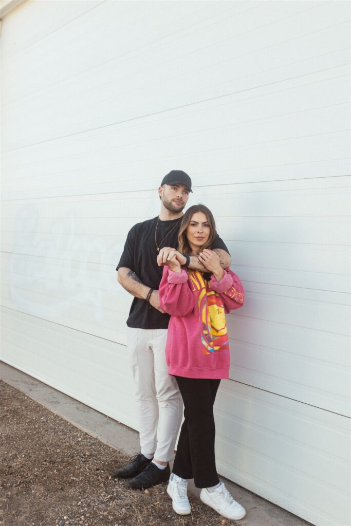 bright and playful photoshoot with couples posing downtown - saskatoon photos