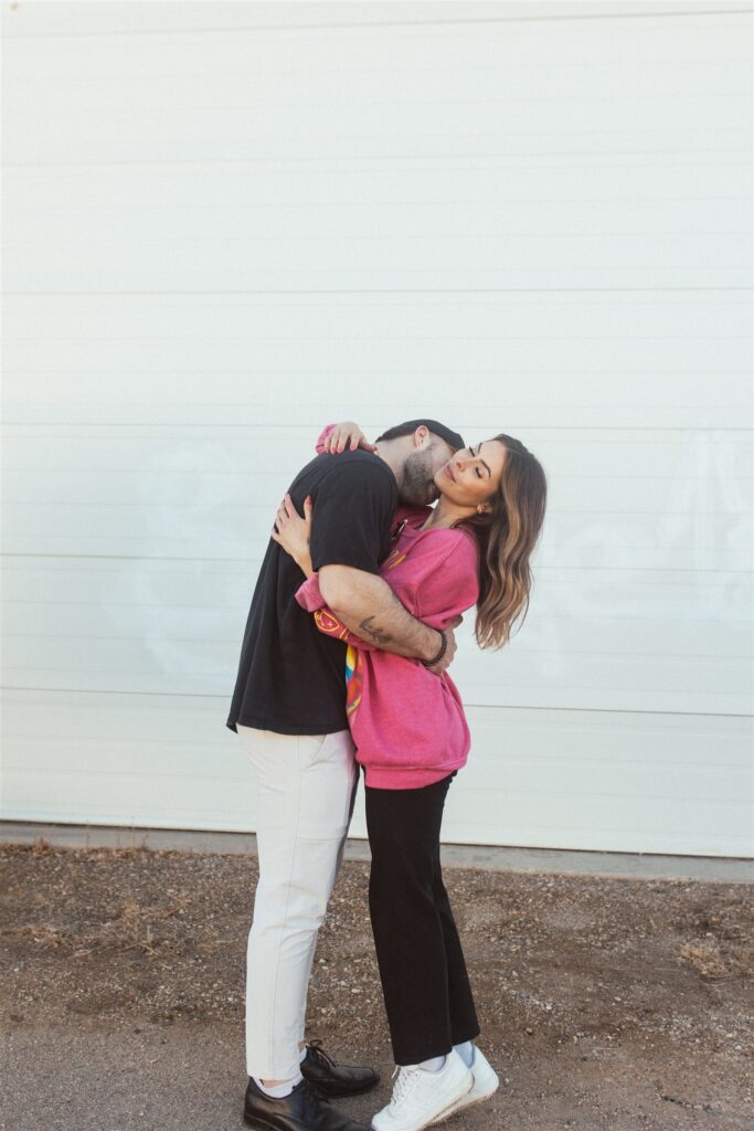 bright and playful photoshoot with couples posing downtown - saskatoon photos
