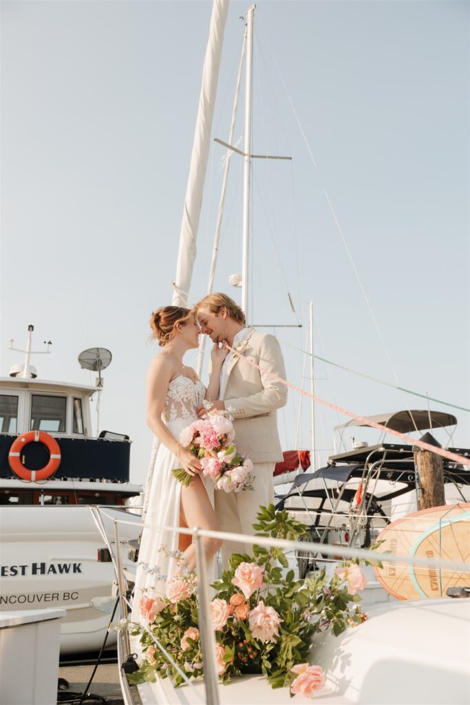 a couple posing in victoria on a boat for their elopement photos
