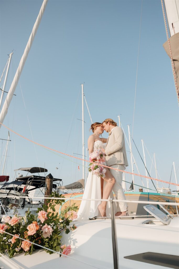 an elopement photoshoot on a sailboat in british columbia