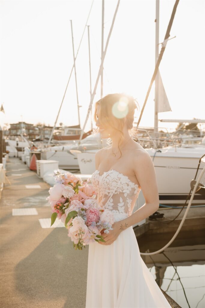 an elopement photoshoot on a sailboat in british columbia