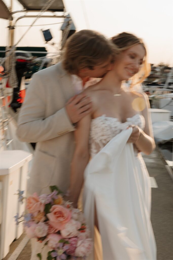 an elopement photoshoot on a sailboat in british columbia