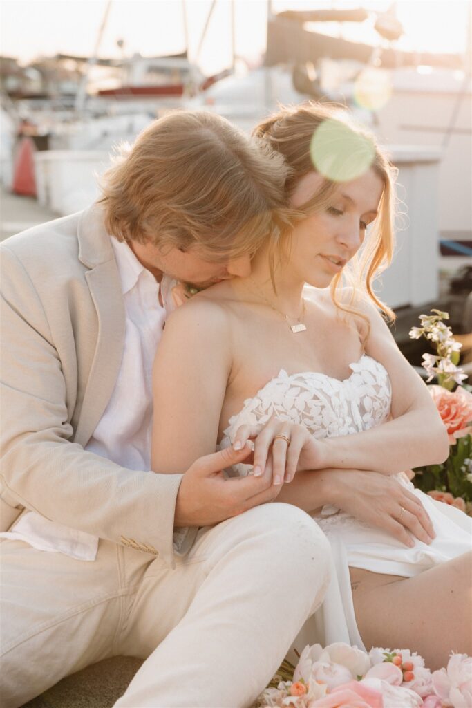 a couple posing in victoria on a boat for their elopement photos