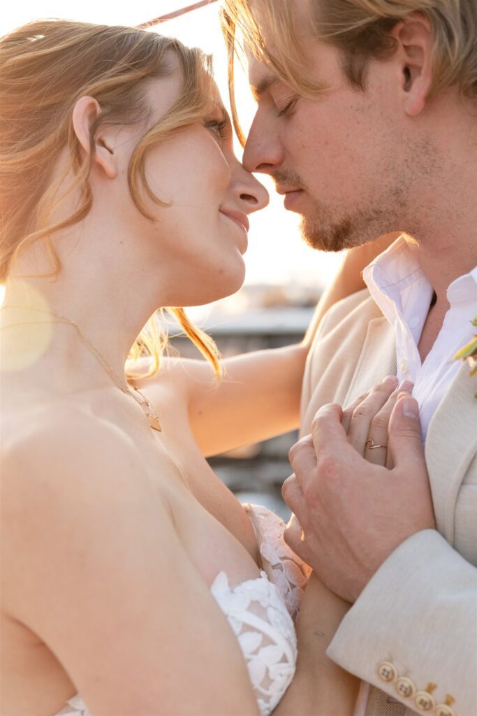 a couple posing in victoria on a boat for their elopement photos
