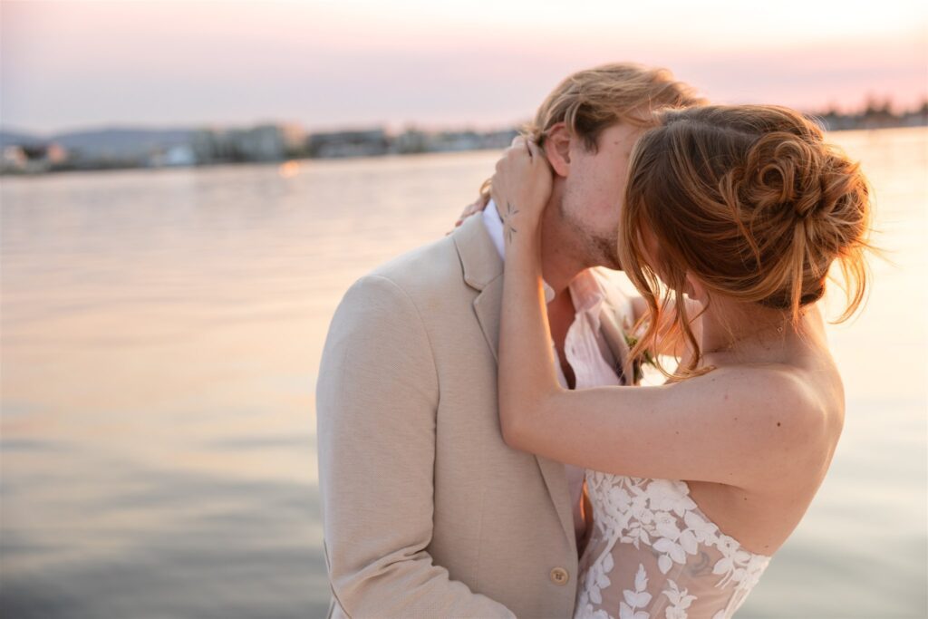 a couple posing in victoria on a boat for their elopement photos
