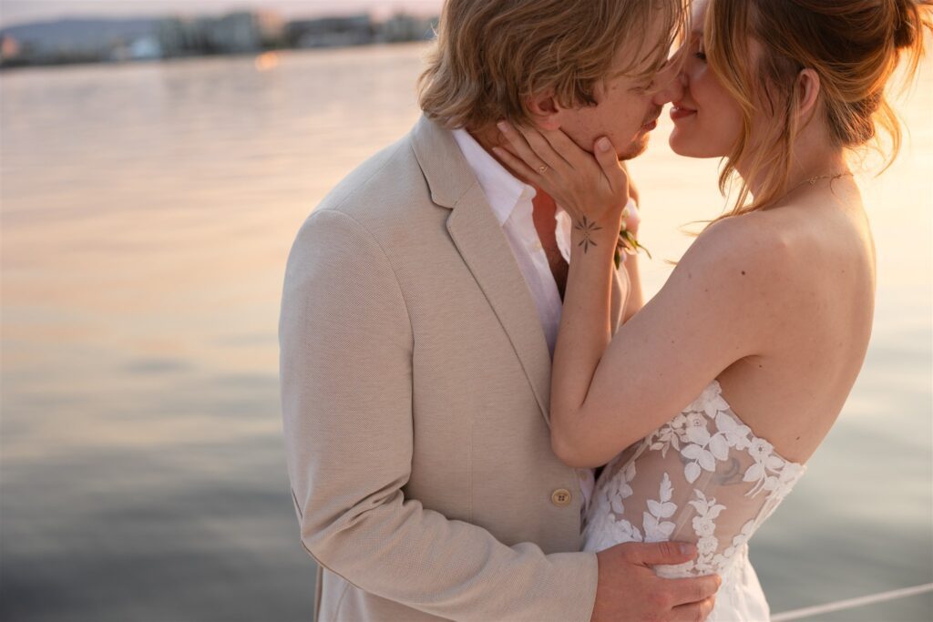 a couple posing in victoria on a boat for their elopement photos
