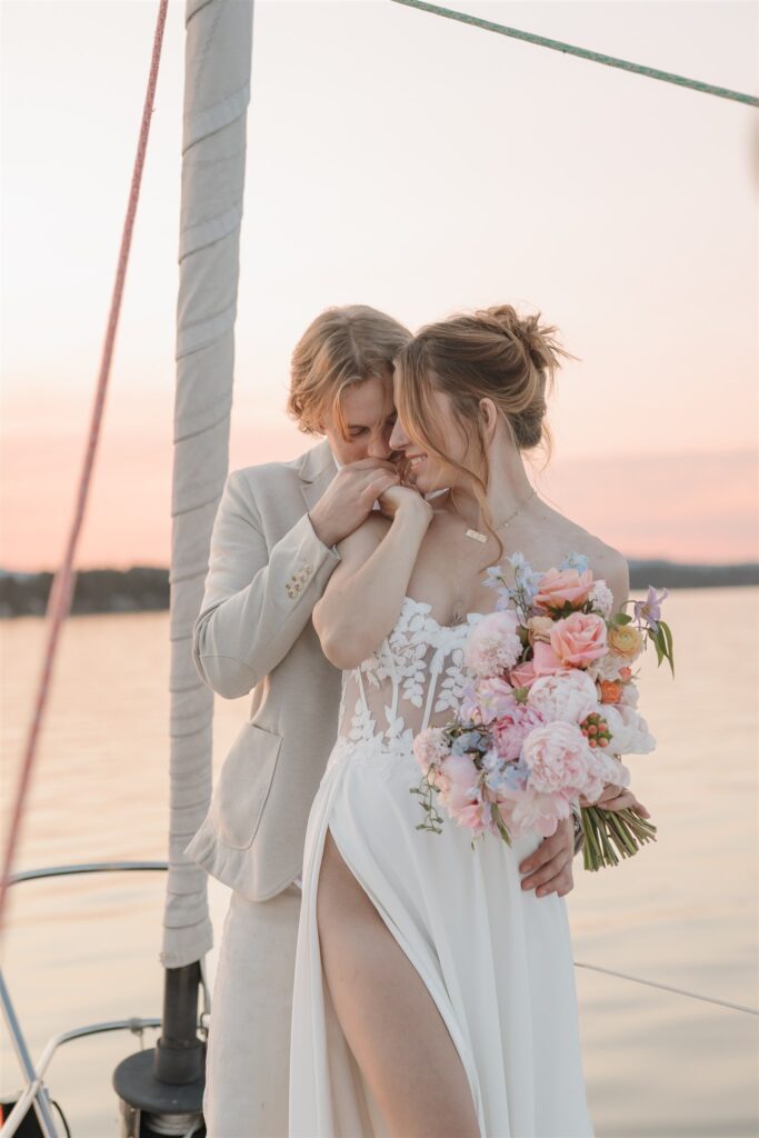 an elopement photoshoot on a sailboat in british columbia