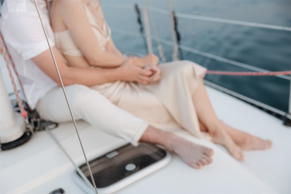 a couple posing in victoria on a boat for their elopement photos
