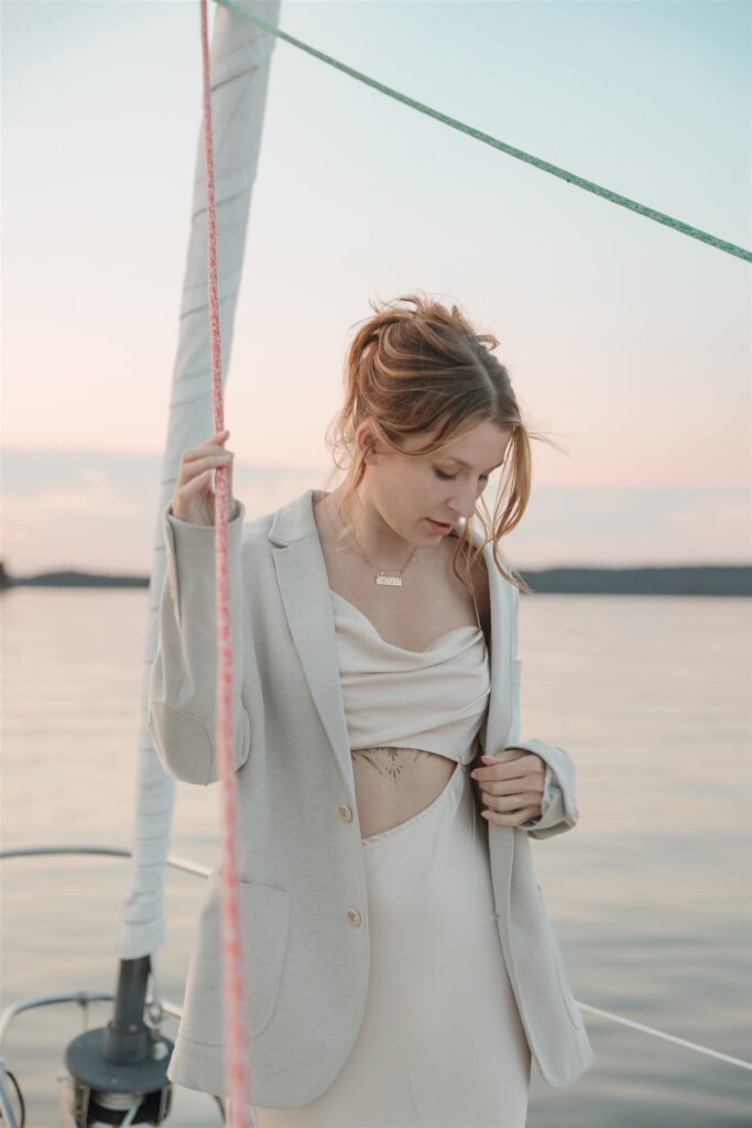 an elopement photoshoot on a sailboat in british columbia