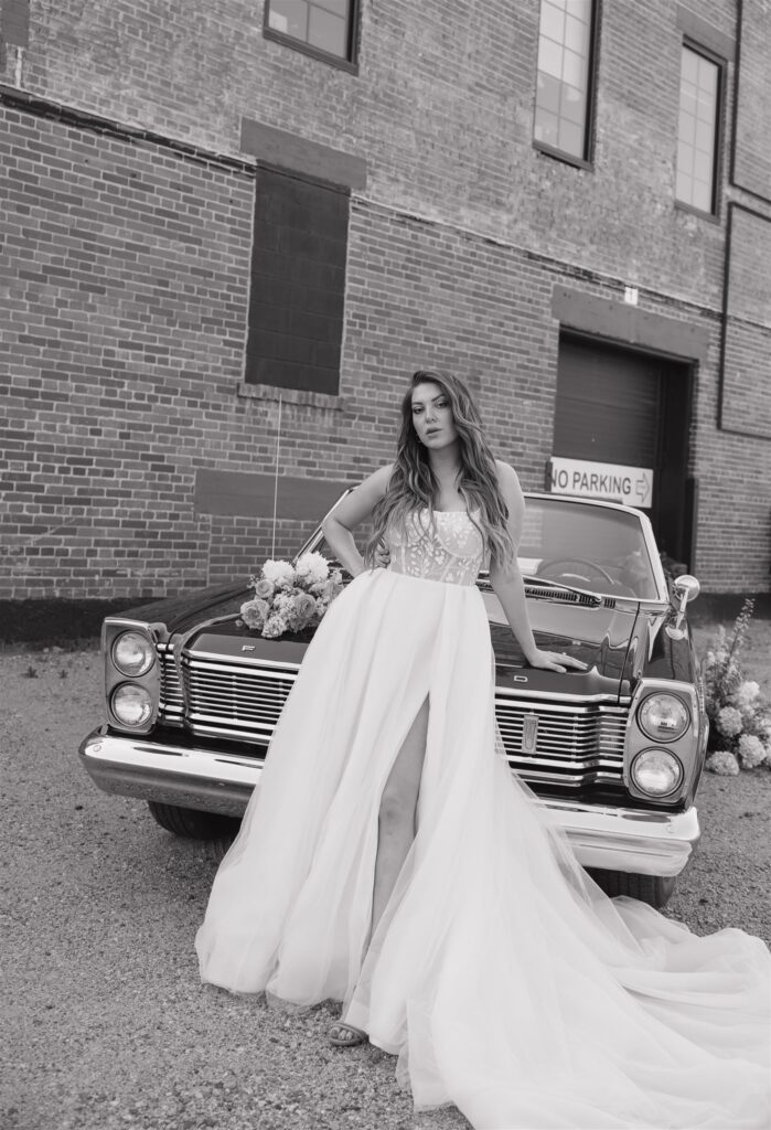 bride posing for her downtown wedding portraits