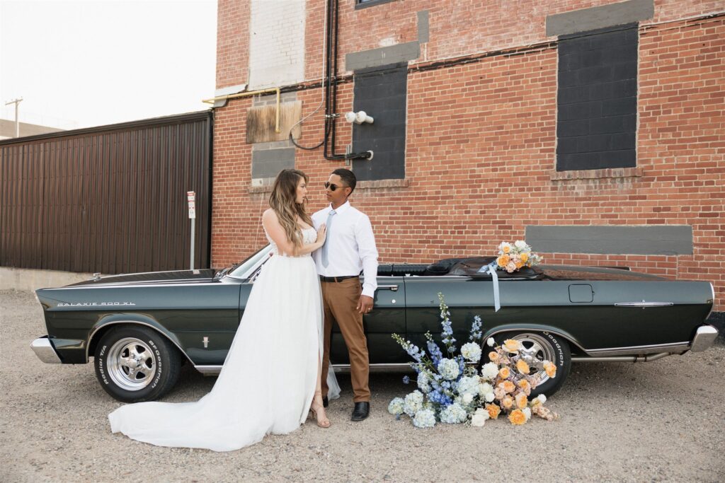 couple posing in downtown Saskatoon for their wedding photos | Modern Editorial Wedding Photos in Downtown Saskatoon
