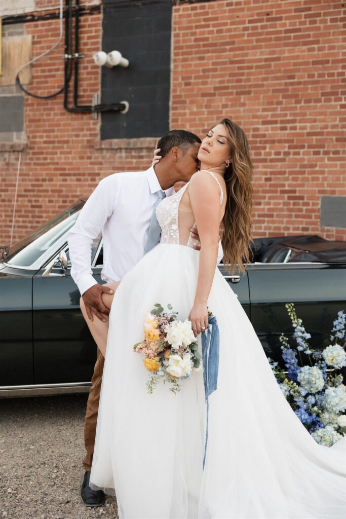 couple posing in downtown Saskatoon for their wedding photos | Modern Editorial Wedding Photos in Downtown Saskatoon