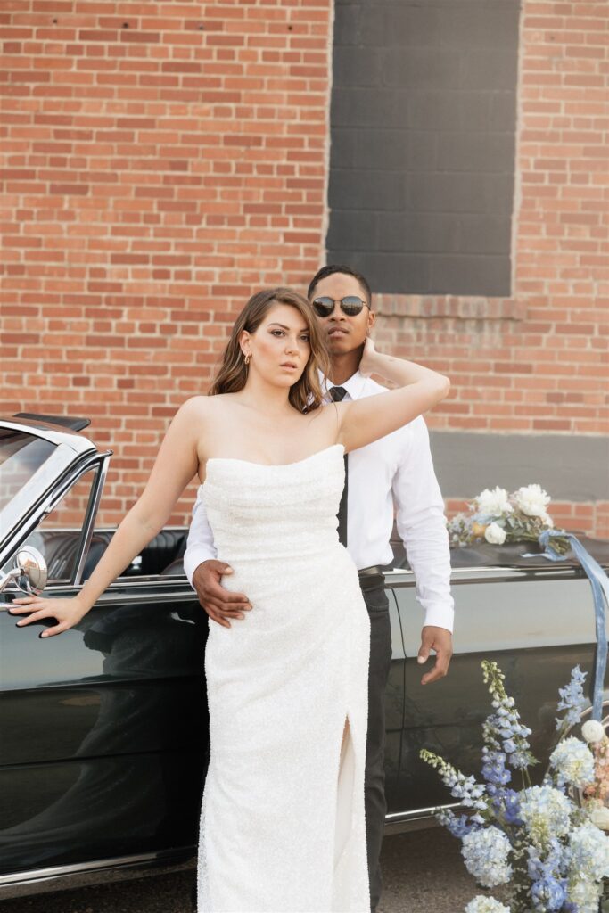 couple posing in downtown Saskatoon for their wedding photos | Modern Editorial Wedding Photos in Downtown Saskatoon
