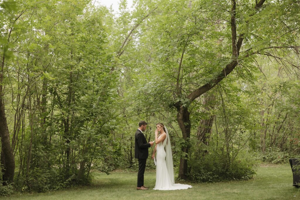 Couple posing for their wedding photos in saskatoon - saskatoon wedding
