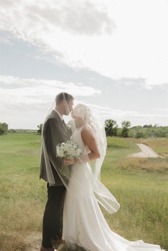 couple portraits after a wedding ceremony in saskatoon