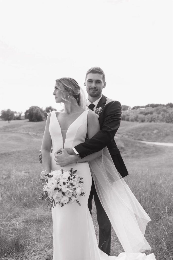 Couple posing for their wedding photos in saskatoon - saskatoon wedding
