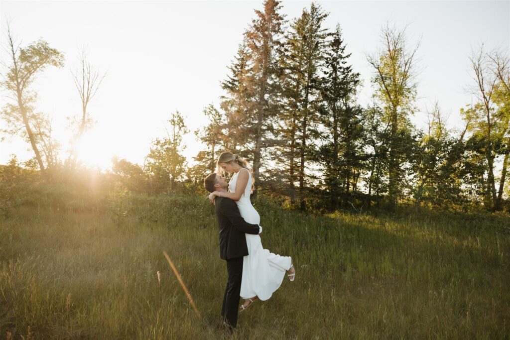 Couple posing for their wedding photos in saskatoon - saskatoon wedding
