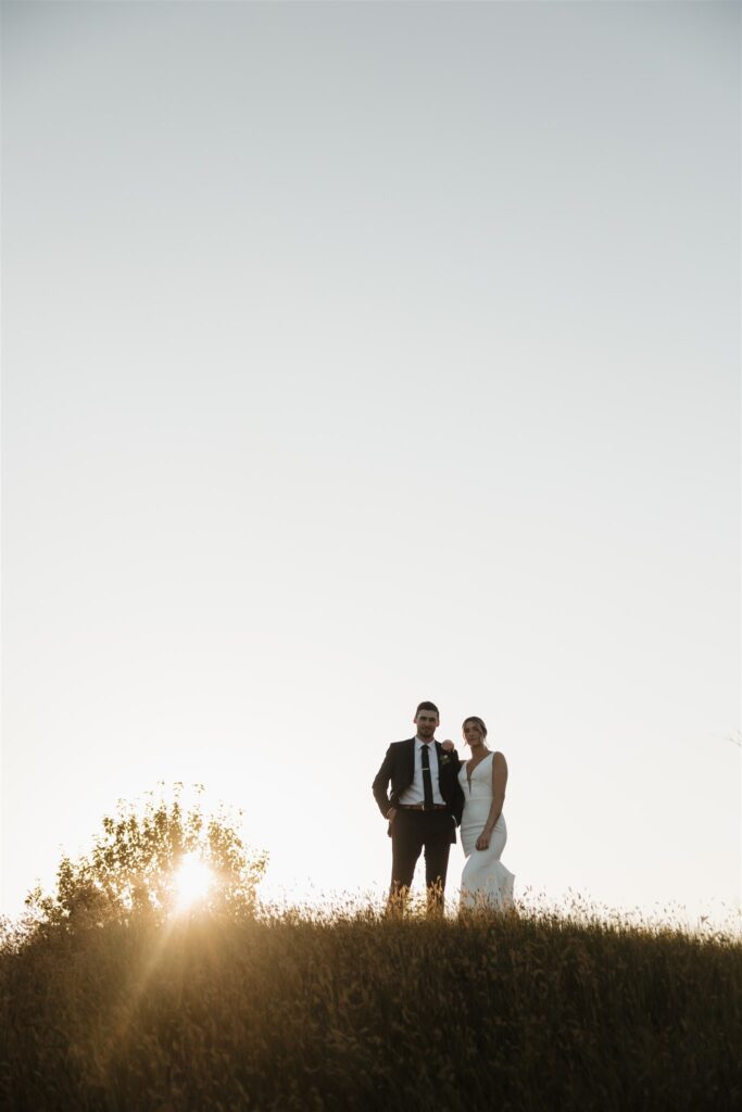 Couple posing for their wedding photos in saskatoon - saskatoon wedding
