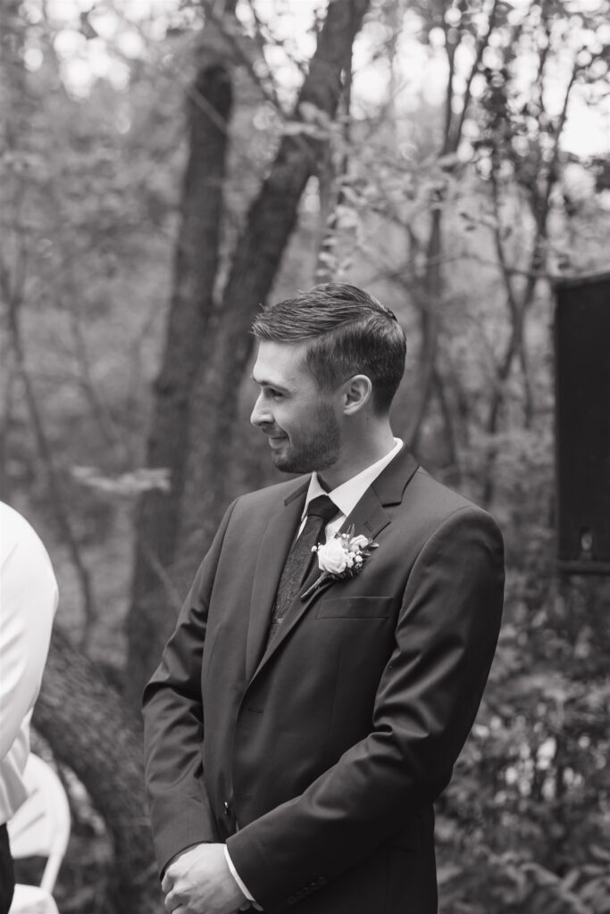 groom waiting during his wedding ceremony