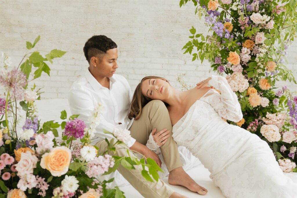 couple posing in a studio for their wedding portraits in canada - editorial wedding
