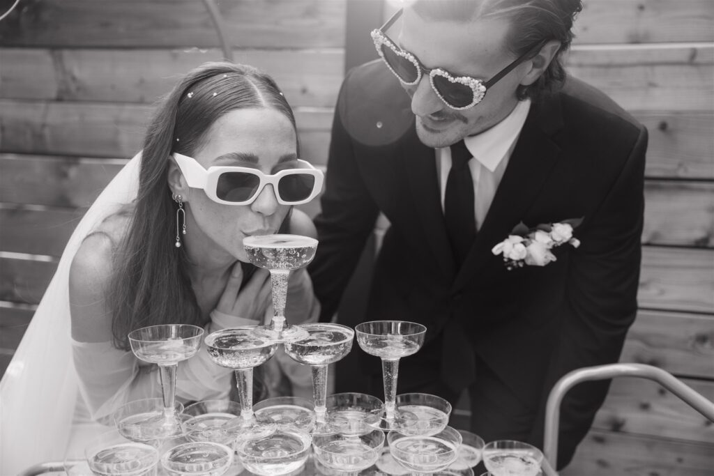 couple doing a champagne fountain