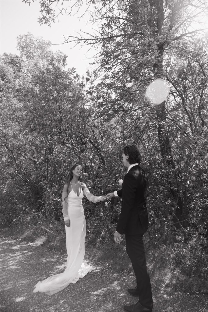 couple doing a first look and exchanging vows