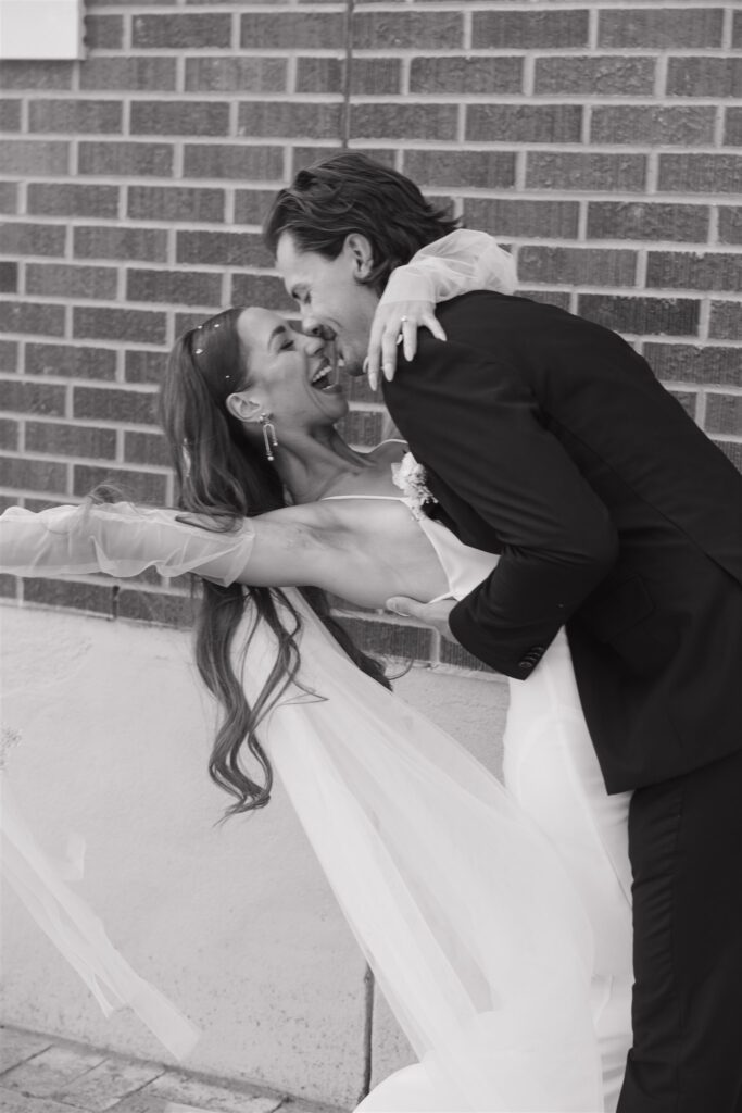 bride and groom posing for their wedding portraits - wedding in moosejaw saskatchewan - ninth avenue studios
