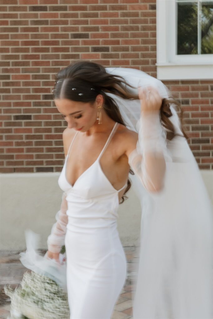 bride posing for wedding photos