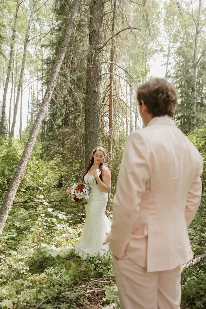 bride and groom posing outdoors for their wedding photos