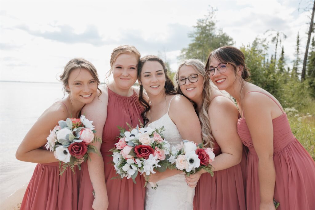 wedding party posing for wedding portrait photos
