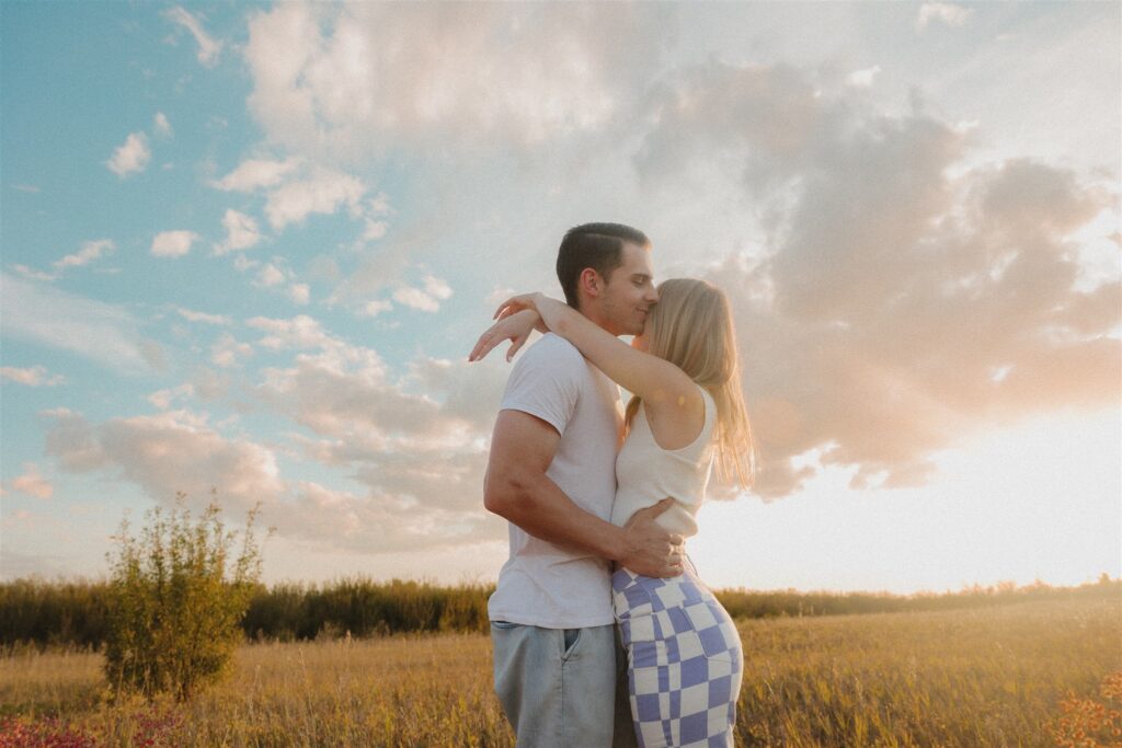 a Canadian couples photoshoot in a field