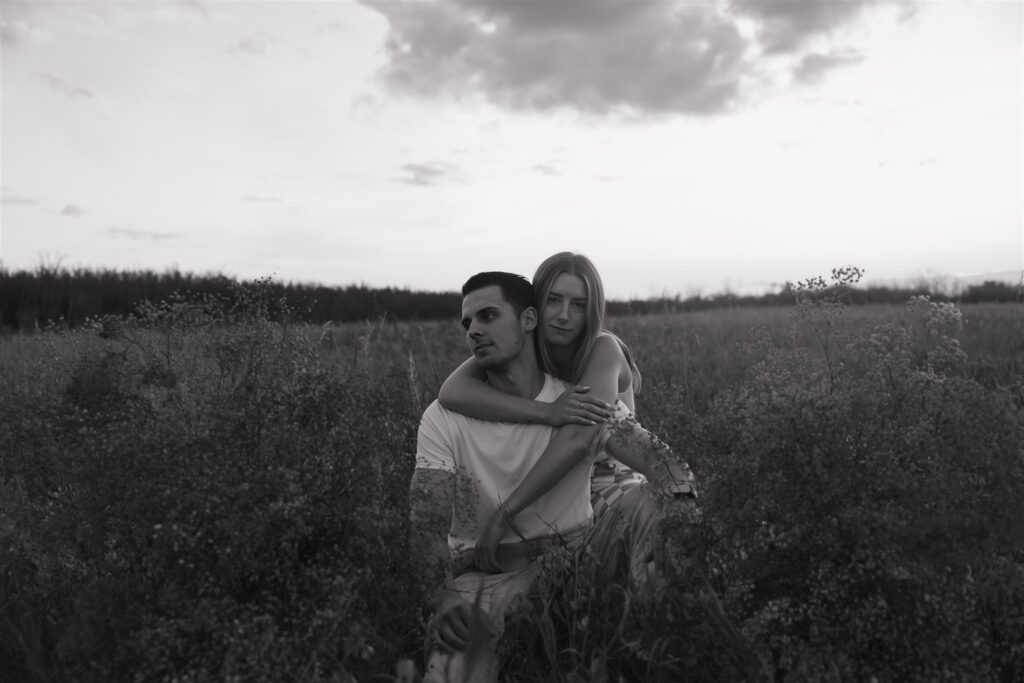 a Canadian couples photoshoot in a field
