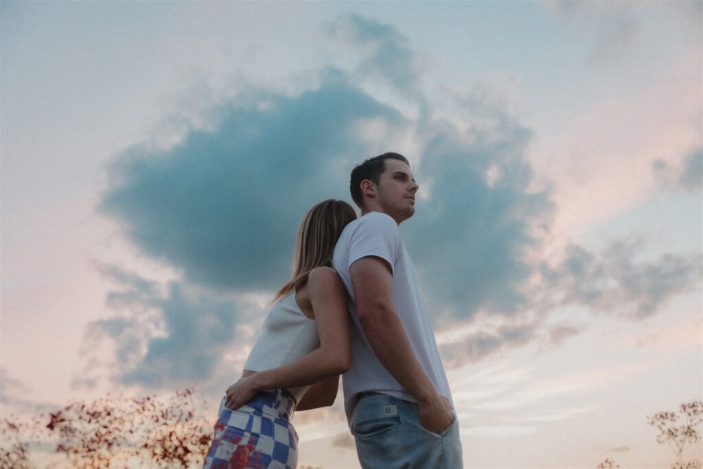 a Canadian couples photoshoot in a field
