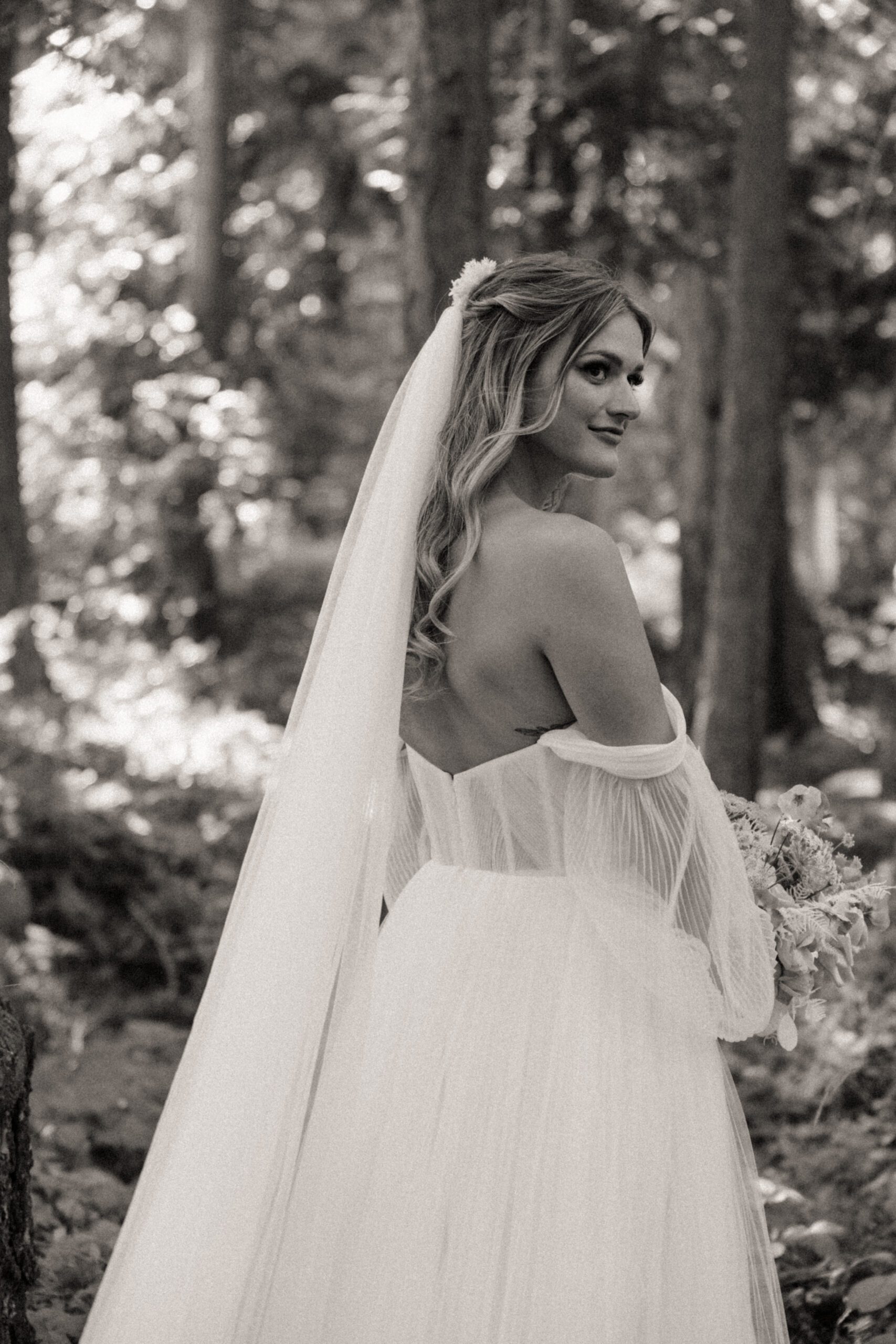 Bride posing for elegant wedding portraits