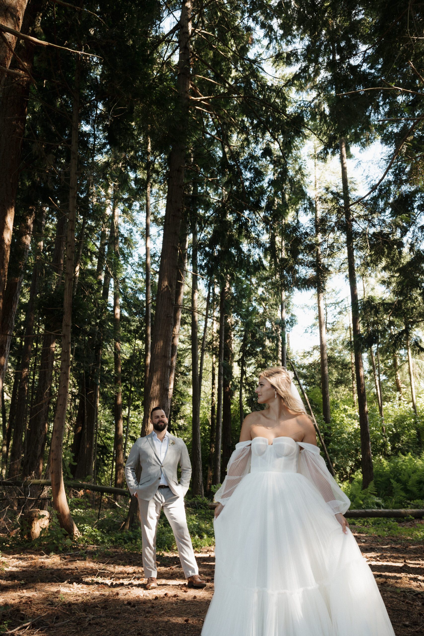 bride and groom posing outdoors in Victoria for a wedding portraits
