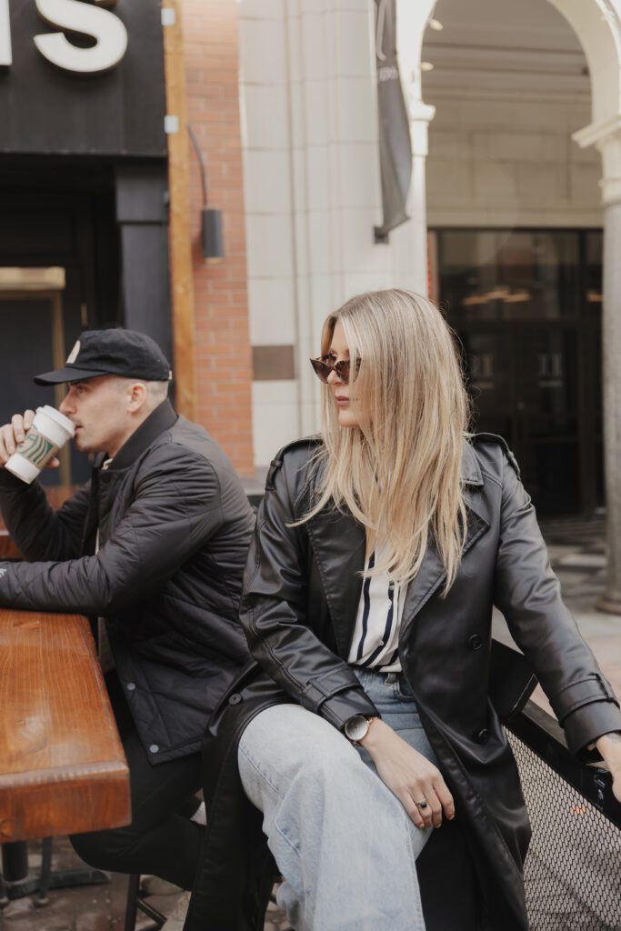 Couple exploring downtown Calgary during their modern edgy couples photoshoot 