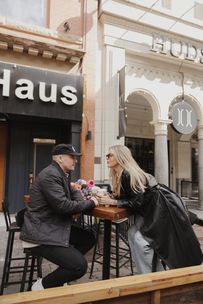 Couple exploring downtown Calgary during their modern edgy couples photoshoot 