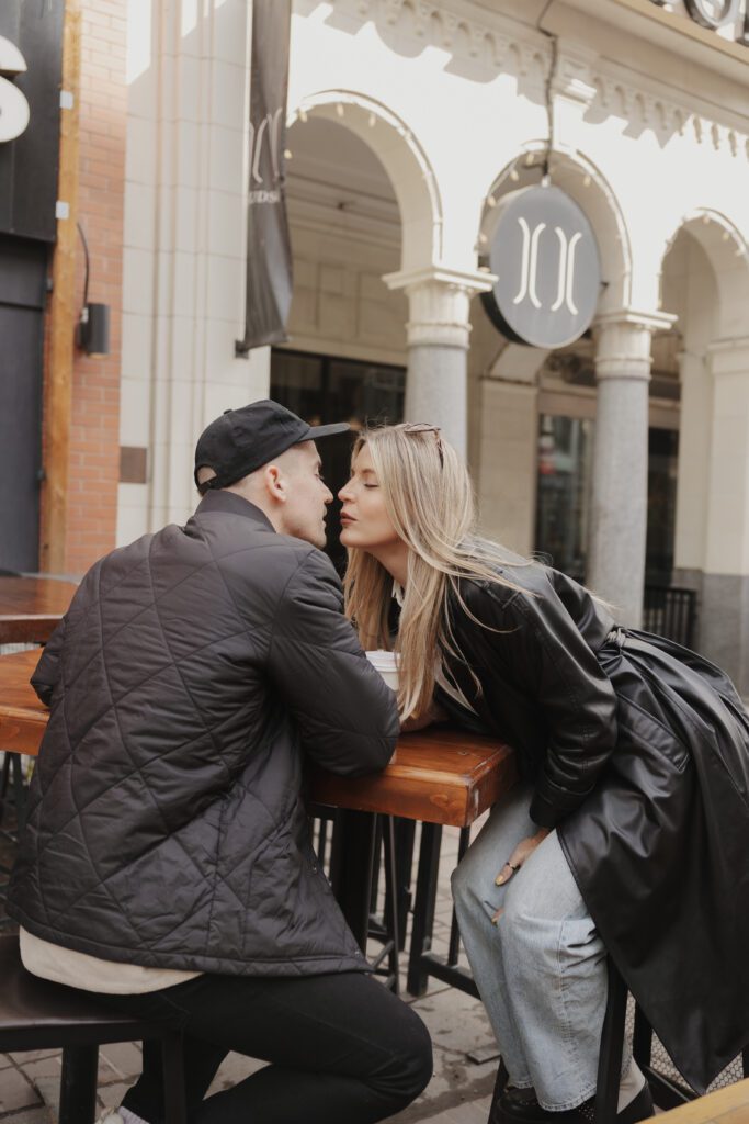 Couple exploring downtown Calgary during their modern edgy couples photoshoot 