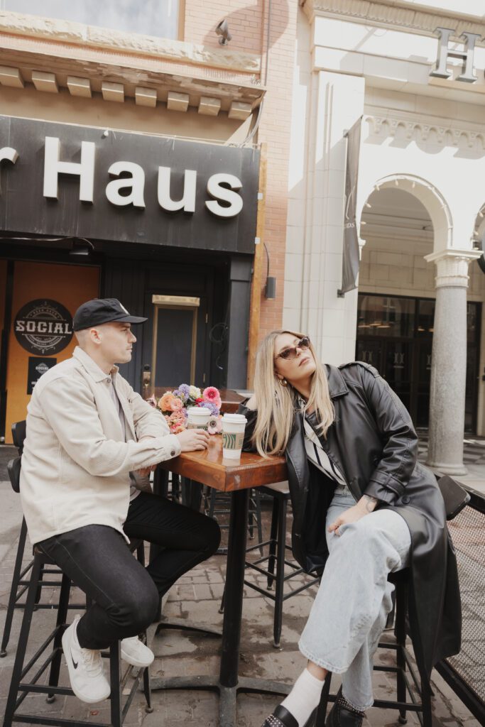 Couple exploring downtown Calgary during their modern edgy couples photoshoot 