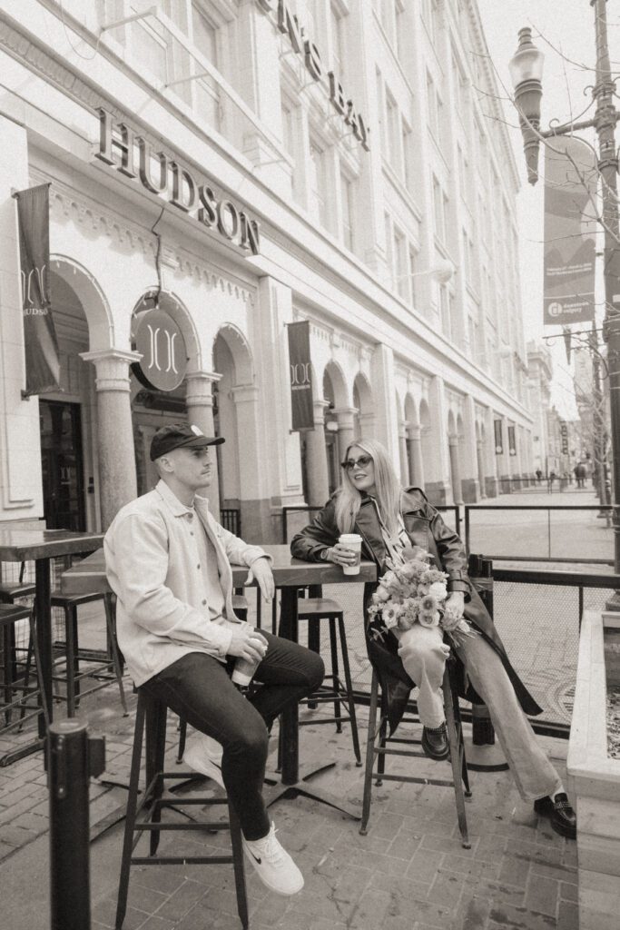 Couple exploring downtown Calgary during their modern edgy couples photoshoot 