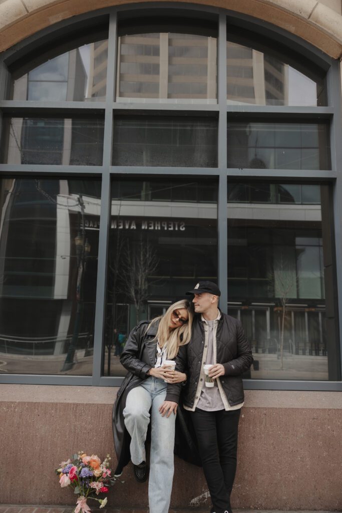 Couple exploring downtown Calgary during their modern edgy couples photoshoot 