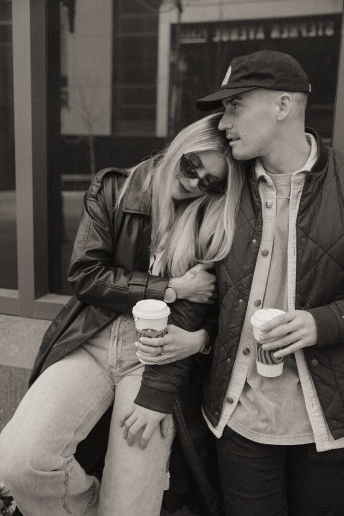 Couple exploring downtown Calgary during their modern edgy couples photoshoot 