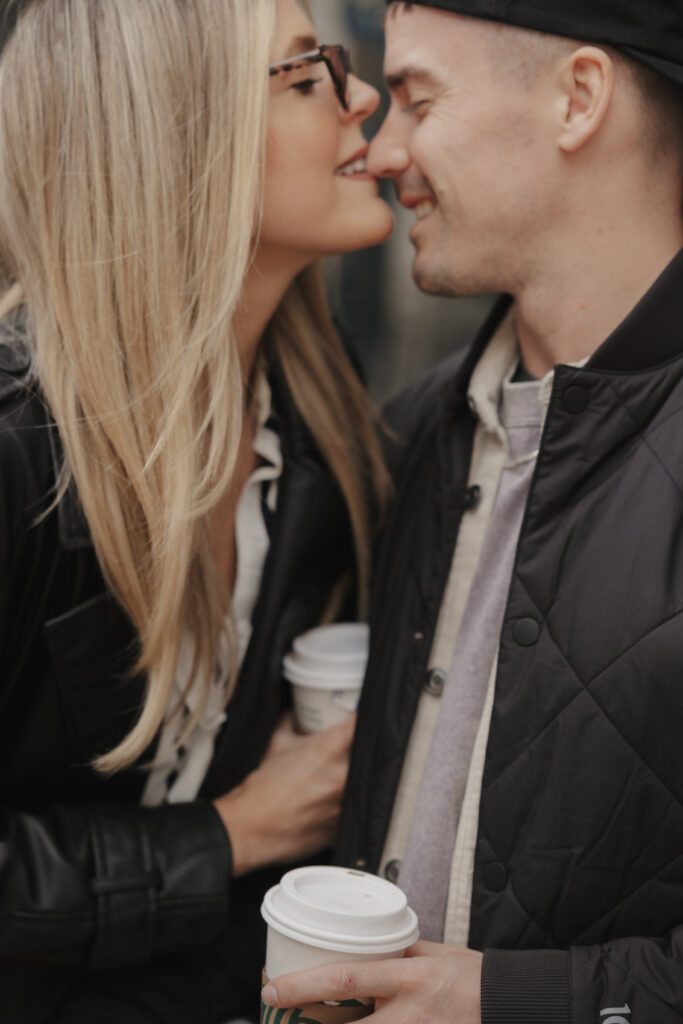 Couple exploring downtown Calgary during their modern edgy couples photoshoot 