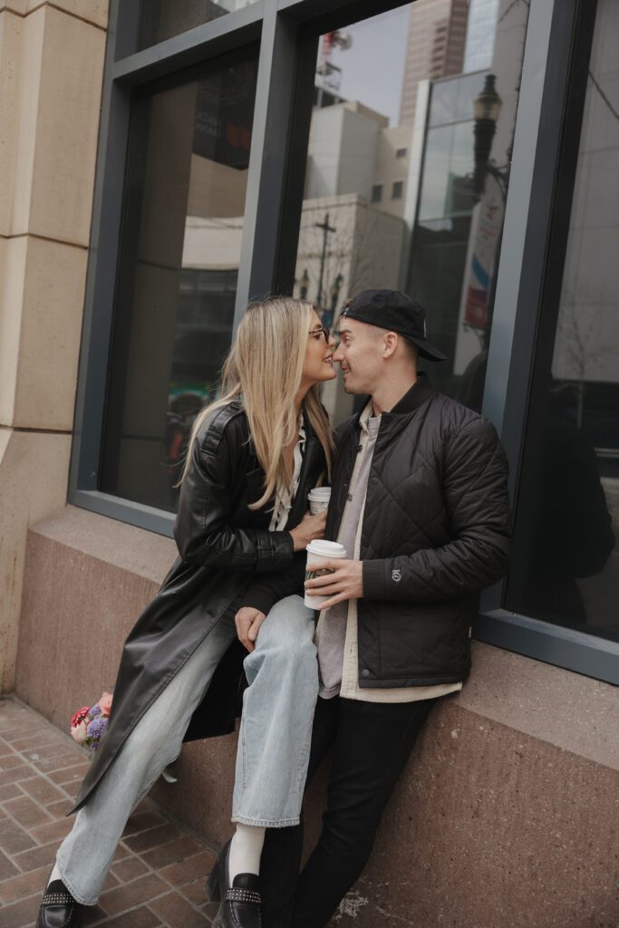 Couple exploring downtown Calgary during their modern edgy couples photoshoot 