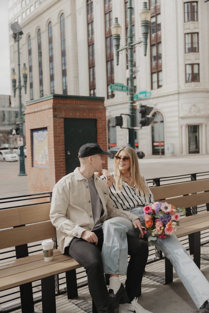 Couple exploring downtown Calgary during their modern edgy couples photoshoot 