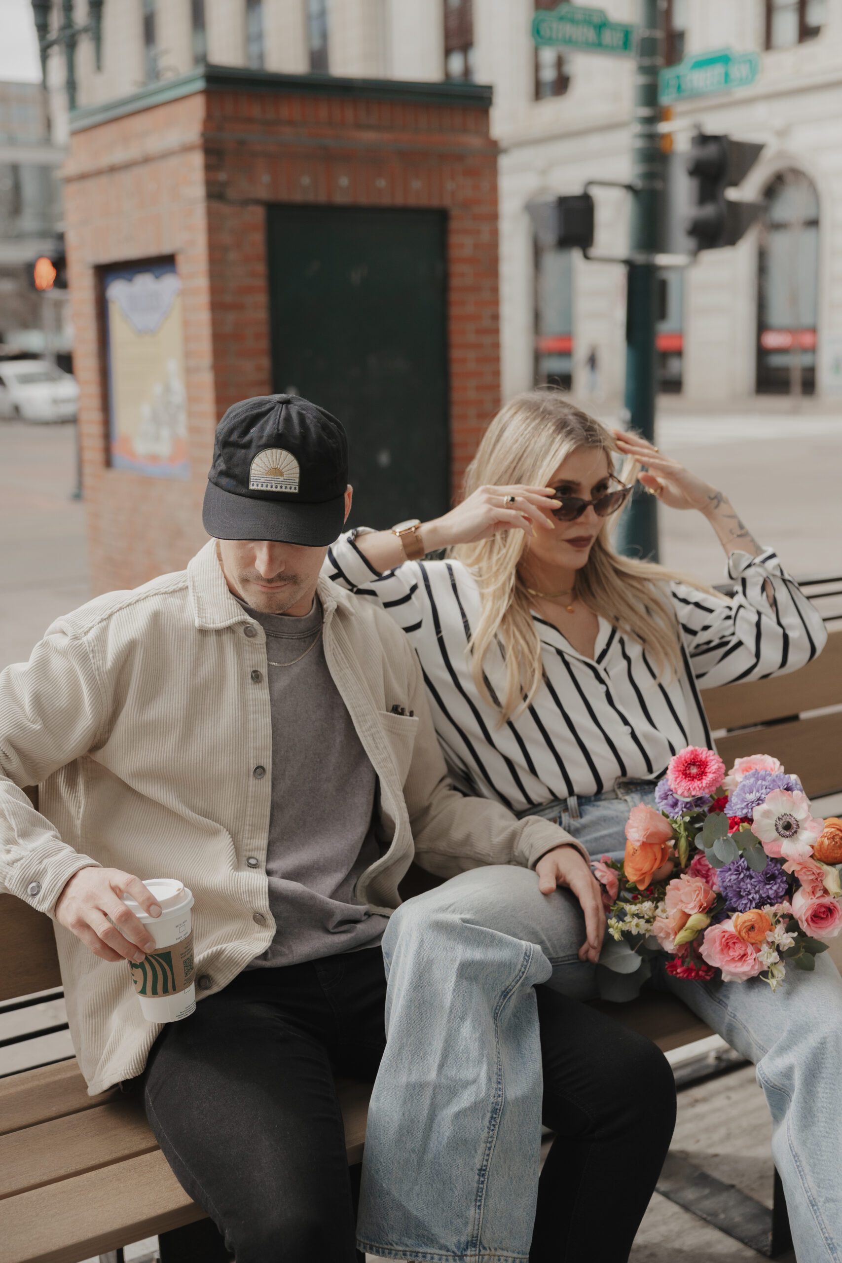 Couple exploring downtown Calgary during their modern edgy couples photoshoot 